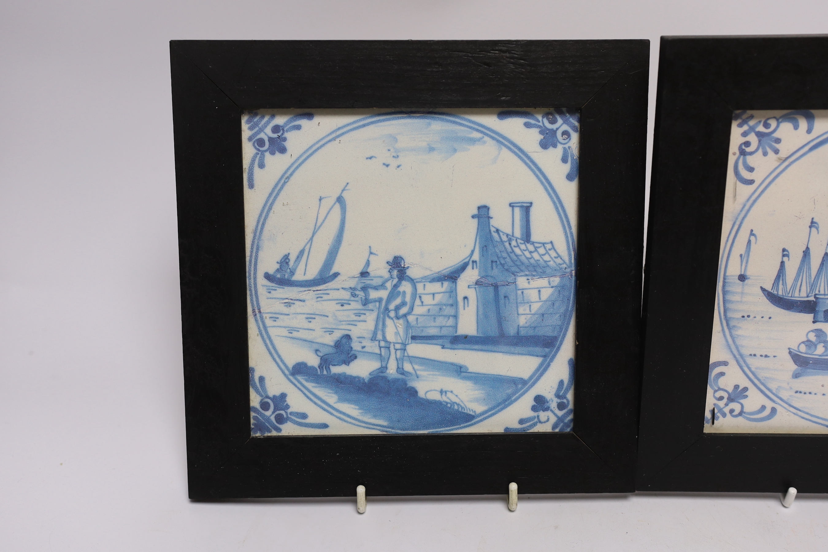 Two framed prints of 18th century Delft blue and white tiles